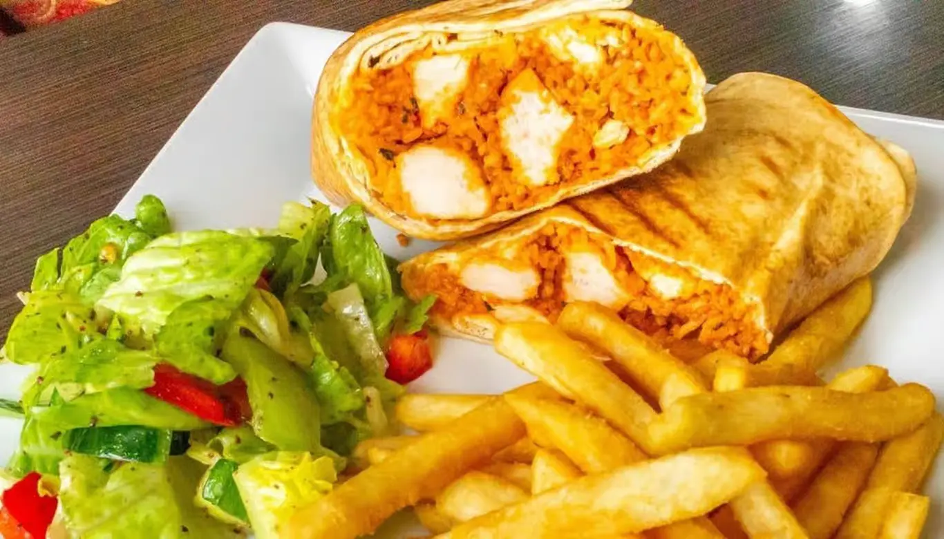 Authentic Butter Chicken Wrap at Nosh Cafe in Edmonton